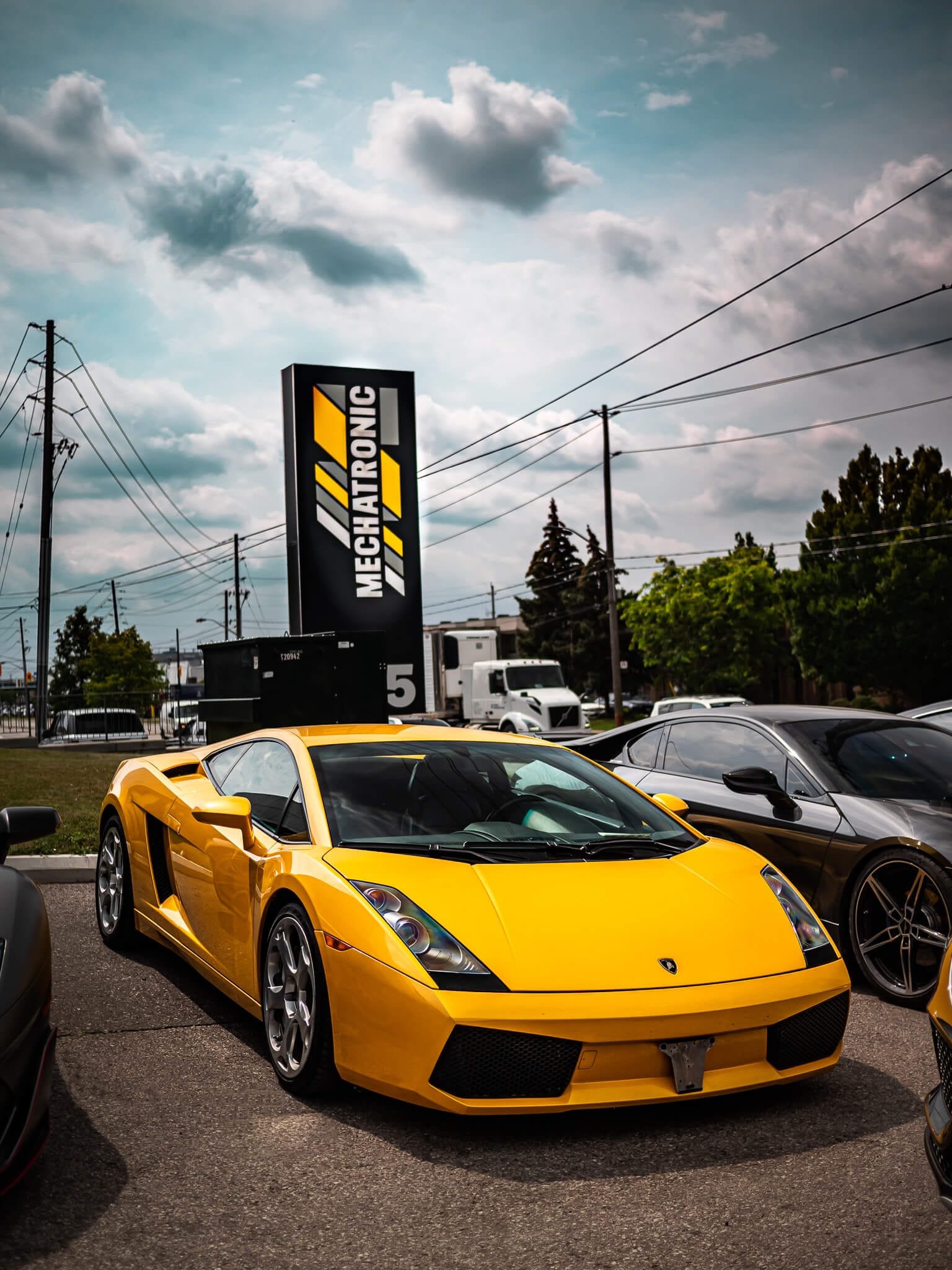 The Dark Yellow Lamborghini Gallardo In the Shop